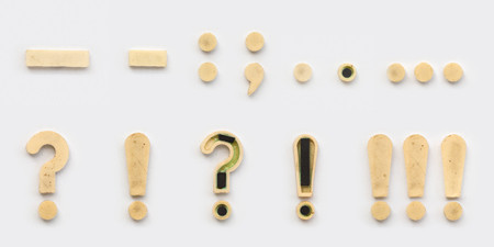 bright plastic cyrillic letters with magnet on white paperの写真素材