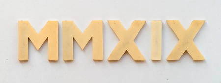 bright plastic roman 2019 with magnet on white paperの写真素材