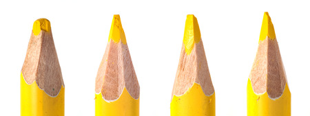 sharpened used yellow pencil lead in wooden wrapping macro closeupの写真素材