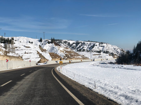 Traveling on a lonely road during winter in Turkey.の写真素材