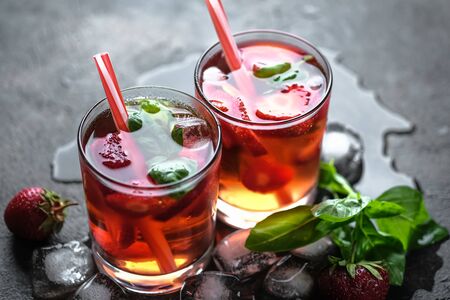 Homemade strawberry lemonade with basil on a dark background.の写真素材