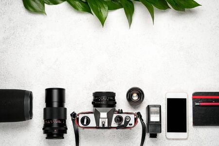 Set of women's clothing and accessories for summer holidays travel in red, blue and white colors. Travel vacation concept. Summer background. Top view copy space.の写真素材