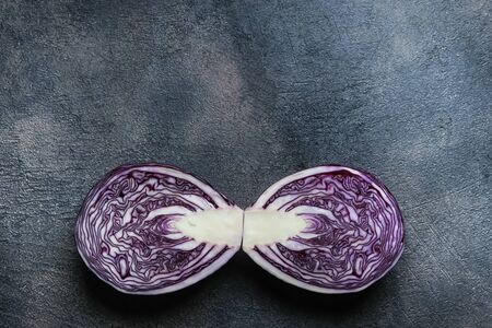 Fresh red cabbage on a black background. Top view. Copy space.の写真素材