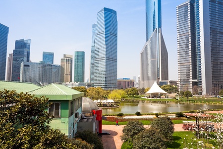 city park with modern building background in shanghai