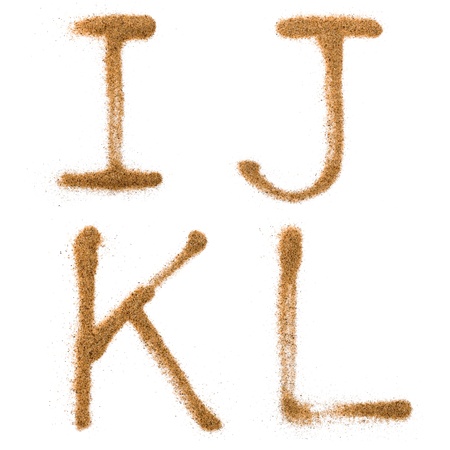 Sand containing letters,isolated on white backgroundの写真素材
