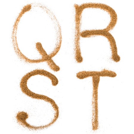 Sand containing letters,isolated on white backgroundの写真素材