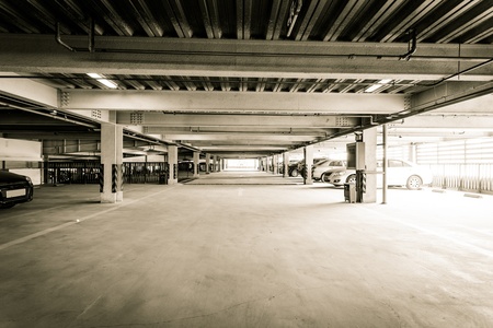Parking garage, interior with a few parked cars.のeditorial素材
