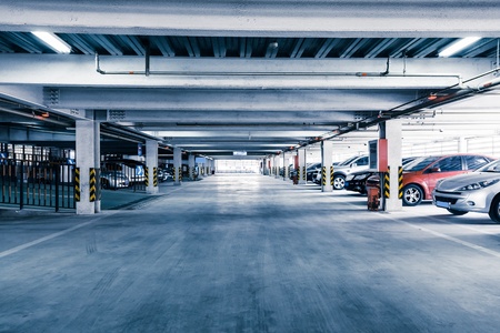 Parking garage, interior with a few parked cars.のeditorial素材