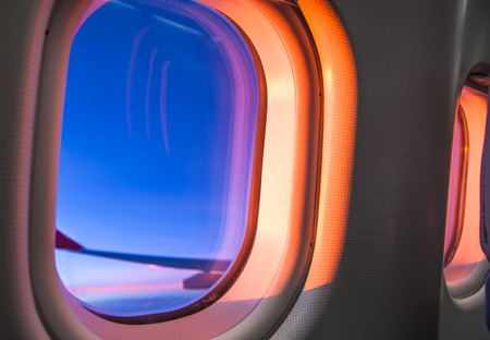 Sky as seen through window of an aircraftの写真素材