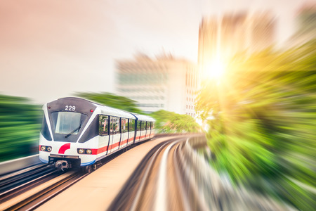 Sky train through the city center in Kuala Lumpur,motion blur