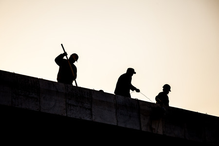 Construction workers silhouetteの写真素材