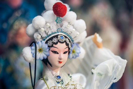 BEIJING, CHINA - DEC 16: Souvenir store's display window, December 16, 2013 in Beijing, China. Chinese classical character model is tourist souvenirsのeditorial素材