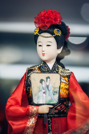 BEIJING, CHINA - DEC 16: Souvenir store's display window, December 16, 2013 in Beijing, China. Chinese classical character model is tourist souvenirsのeditorial素材