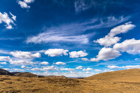 grassland of China under blue skyの写真素材