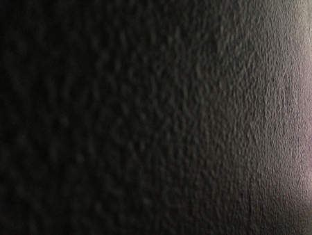 Dimpled effect on a painted wall.の素材