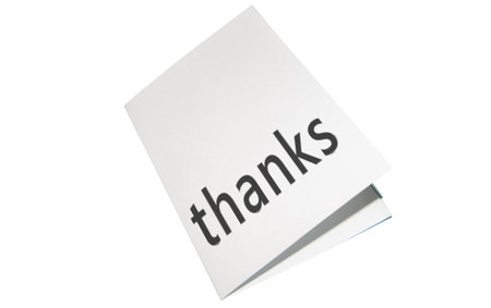 White folded piece of paper greeting card signed thanks, card layout template, thank youの写真素材