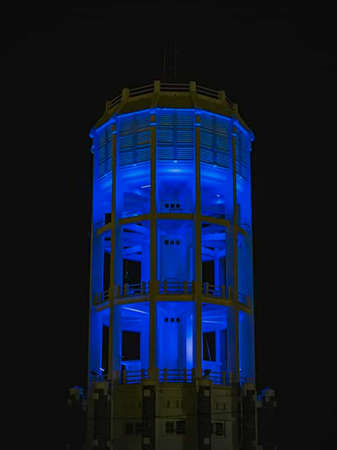 colorful lights of the PDAM building at night, in the city of Tegal, Indonesia.の写真素材