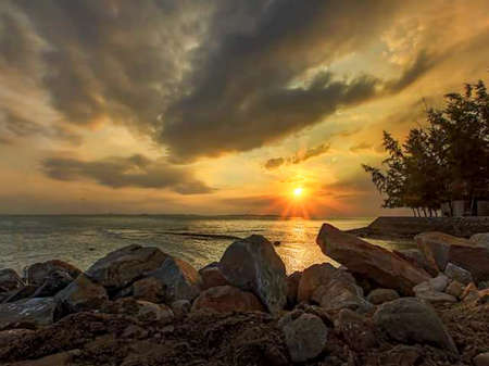 the beauty of the panorama of the sunset landscape on the coast of Indonesia.