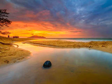 the beauty of the panorama of the sunset landscape on the coast of Indonesia.の写真素材
