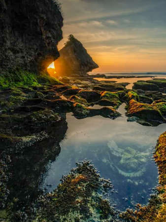 the beauty of the orange sunset in Indonesiaの写真素材