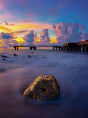 the beauty of the orange sunset in Indonesiaの写真素材