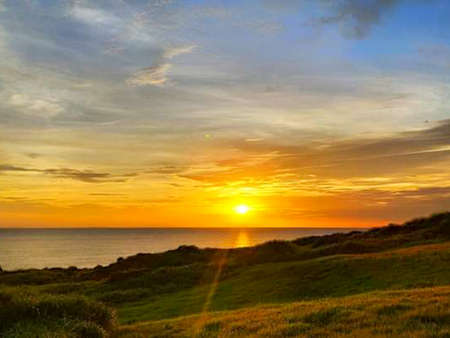Sunset on the Atlantic Ocean, Cornwall, England, UK.の写真素材