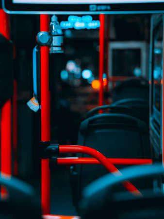 Inside of a bus with red lights and black seats. High quality photoの写真素材