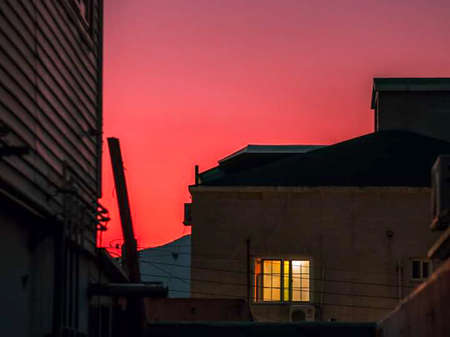 Sunset over the roofs of houses in the old city of Istanbulの写真素材