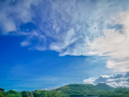 Beautiful landscape with blue sky and white clouds on the mountain.の写真素材