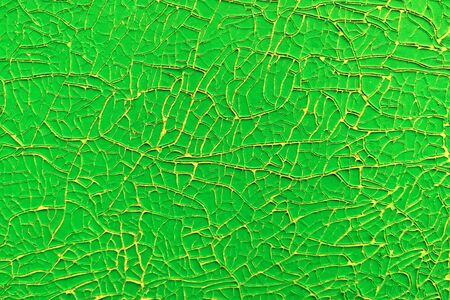 Old green cracked paint on wall. Abstract backgroundの写真素材