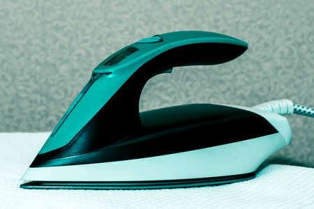 Instructor man teaches woman to drive water scooter. Sunny autumn day. Side view. Crimea, Sudak - 10 October 2020.のeditorial素材