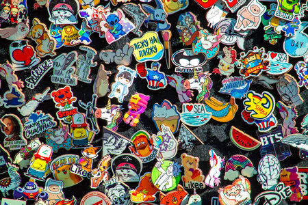 Badges on clothes. Background. Sunny summer day. Top view. Crimea, Sudak - 10 October 2020.のeditorial素材