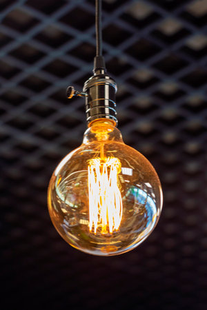 Incandescent in retro style. Front view, indoors horizontal shot.