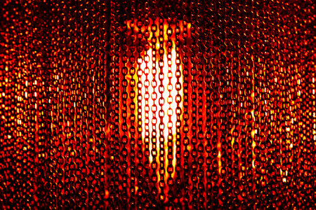 Part of red chandelier. Front view, indoors horizontal shot.
