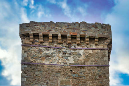 Tower Sudak Genoese fortress. Sunny autumn day. Beautiful nature. Crimea, Sudak - 10 October 2020.のeditorial素材