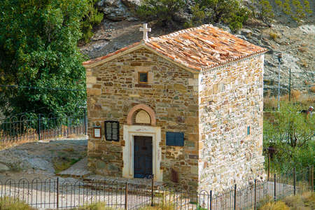 Ancient Christian Byzantine Church. Sunny autumn day. Front view. Crimea, Sudak - 10 October 2020.のeditorial素材