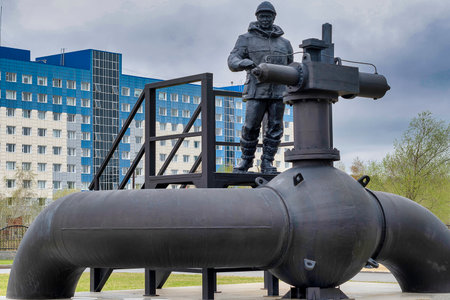 Monument to oilman. Day, vertical shot Front view. Surgut, Russia - 17, May 2021.のeditorial素材