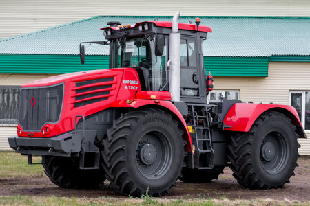 Powerful red tractors brand Kirovets, Bashkortostan, Russia - 19 June, 2022.のeditorial素材