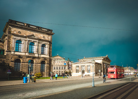 Wide road with old buildings.