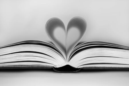 Pages of a book folded in to a heartの写真素材