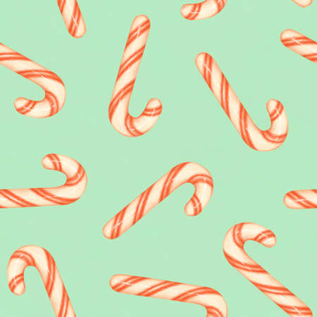 Christmas seamless pattern with candy canes. Red and white striped candy canes on a blue backgroundの写真素材