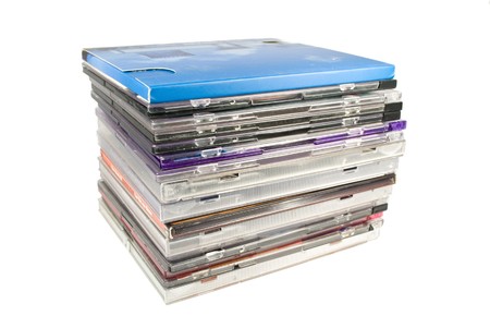 A pile of optical disc cases. Isolated on white