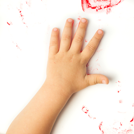 Children's hands isolated on a white background .の写真素材