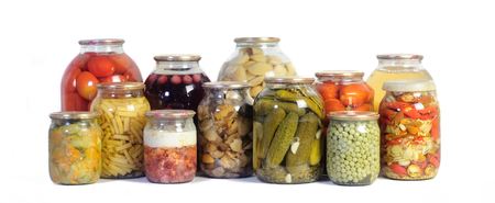 collection various canned vegetables in glass jars isolated on white .の写真素材