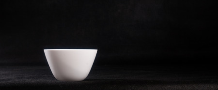 A white tureen on a black background .の写真素材