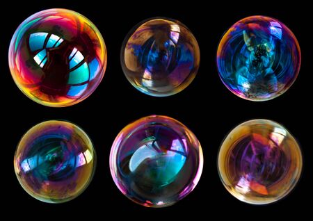 soap bubbles isolated on black background .の写真素材