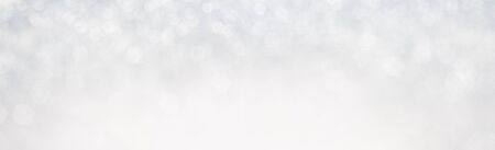 Abstract background with a white light blurの写真素材