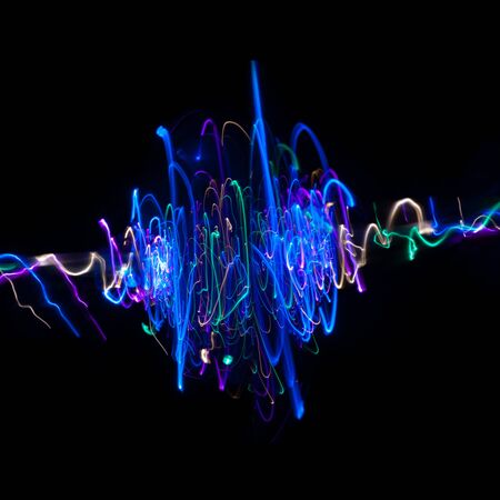 Light drawings on black background. Lines on a spiral .