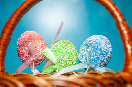 Easter eggs are decorated with decorative shiny glitter.の写真素材