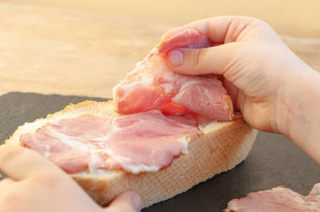 Hand children's makes a sandwich.の写真素材